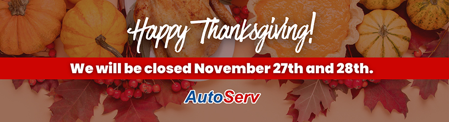 Thanksgiving closure notice with pumpkins and autumn leaves.